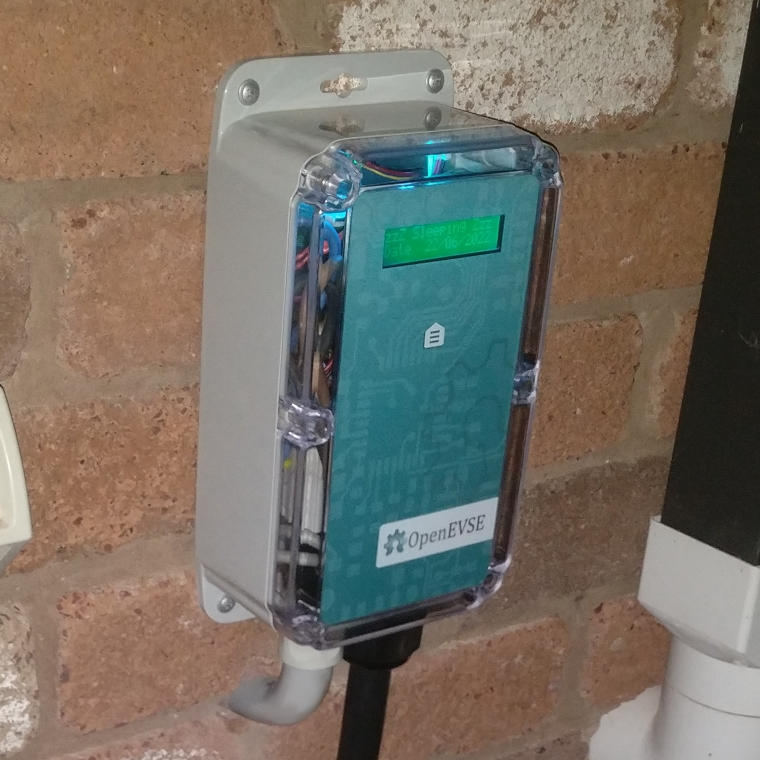 OpenEVSE mounted on brick wall